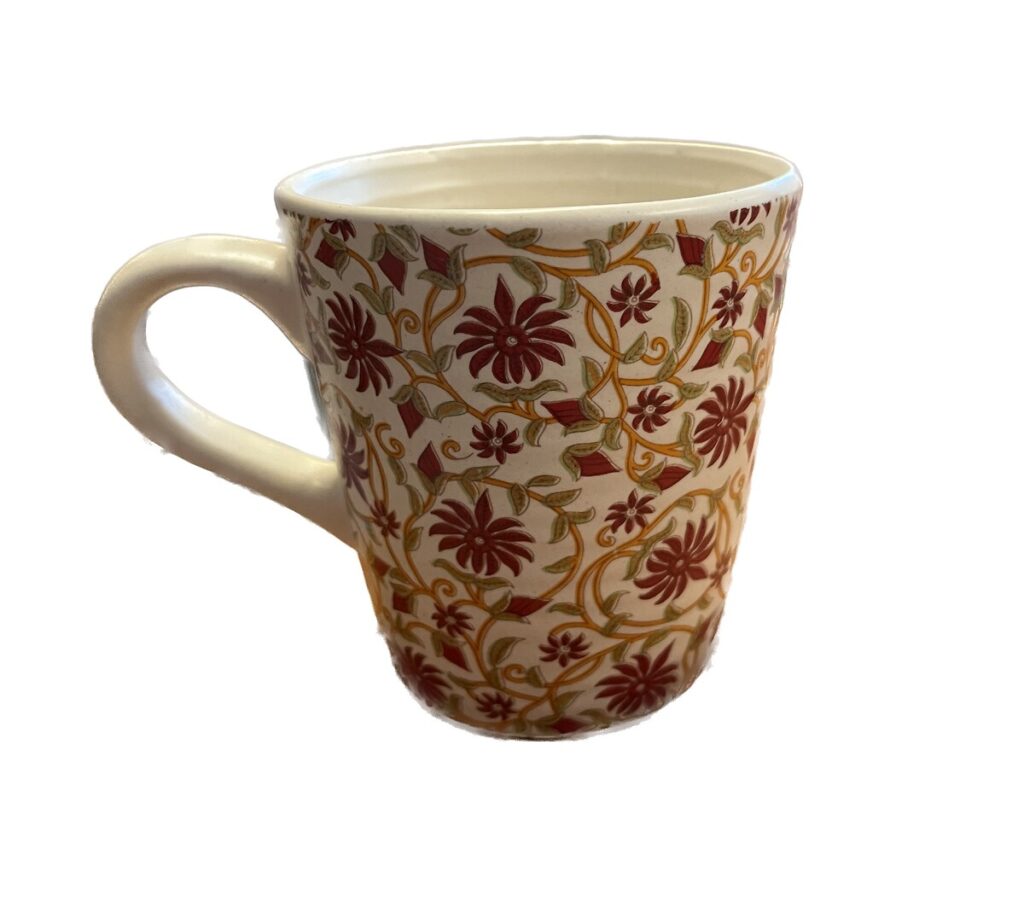 Mug céramique écru avec fleur orange